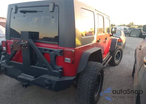 2010 Jeep Wrangler Unlimited Rubicon from USA, damaged, VIN 1J4BA6H11AL128604